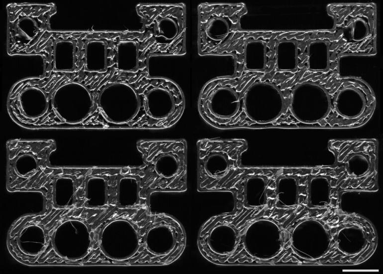 四个3D打印部件分别由四台不同的打印机制作而成。深度学习模型可以识别每个部件的来源打印机 四个3D打印部件分别由四台不同的打印机制作而成。深度学习模型可以识别每个部件的来源打印机